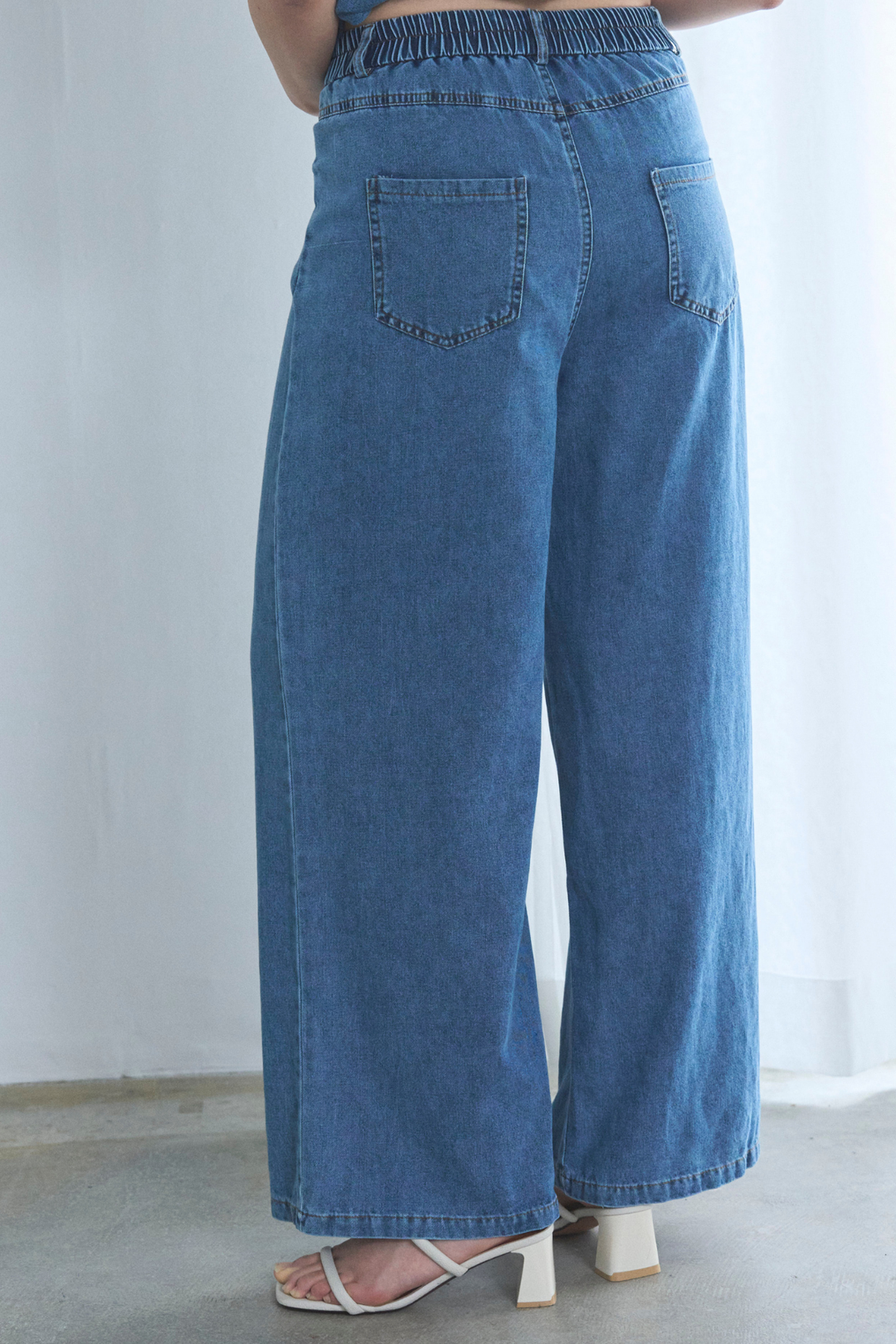 デニムペプラムホルターネックトップス ×デニムワイドパンツ