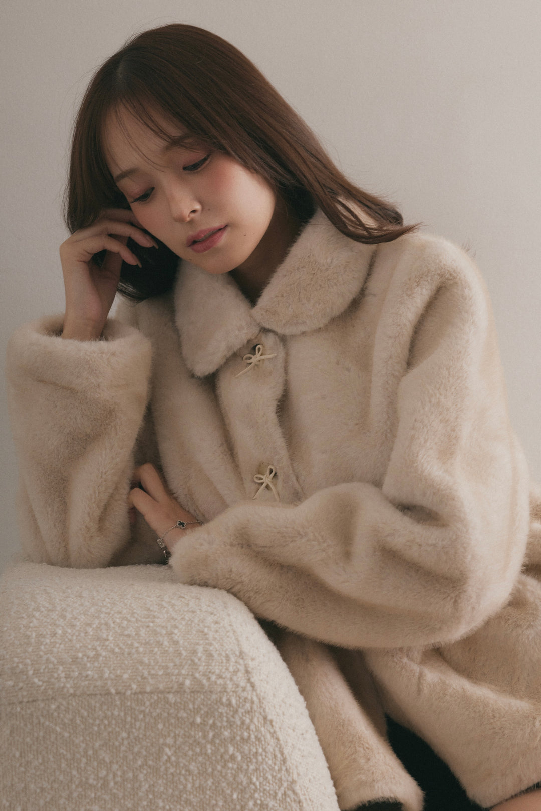 ペプラムファーコート